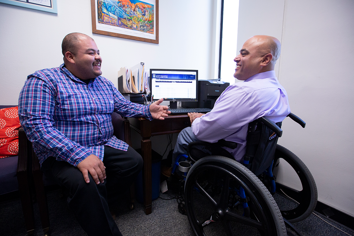 student being advised by Project Rebound staff member