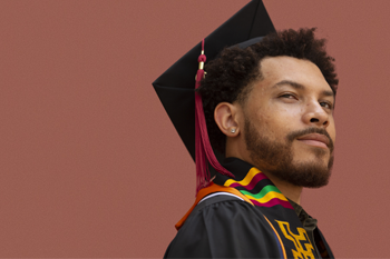 student in graduation cap and gown