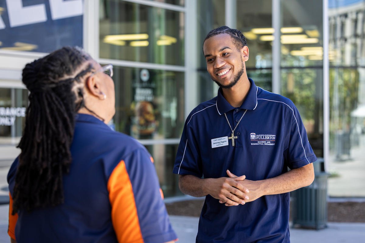 Two Staff Members Talking
